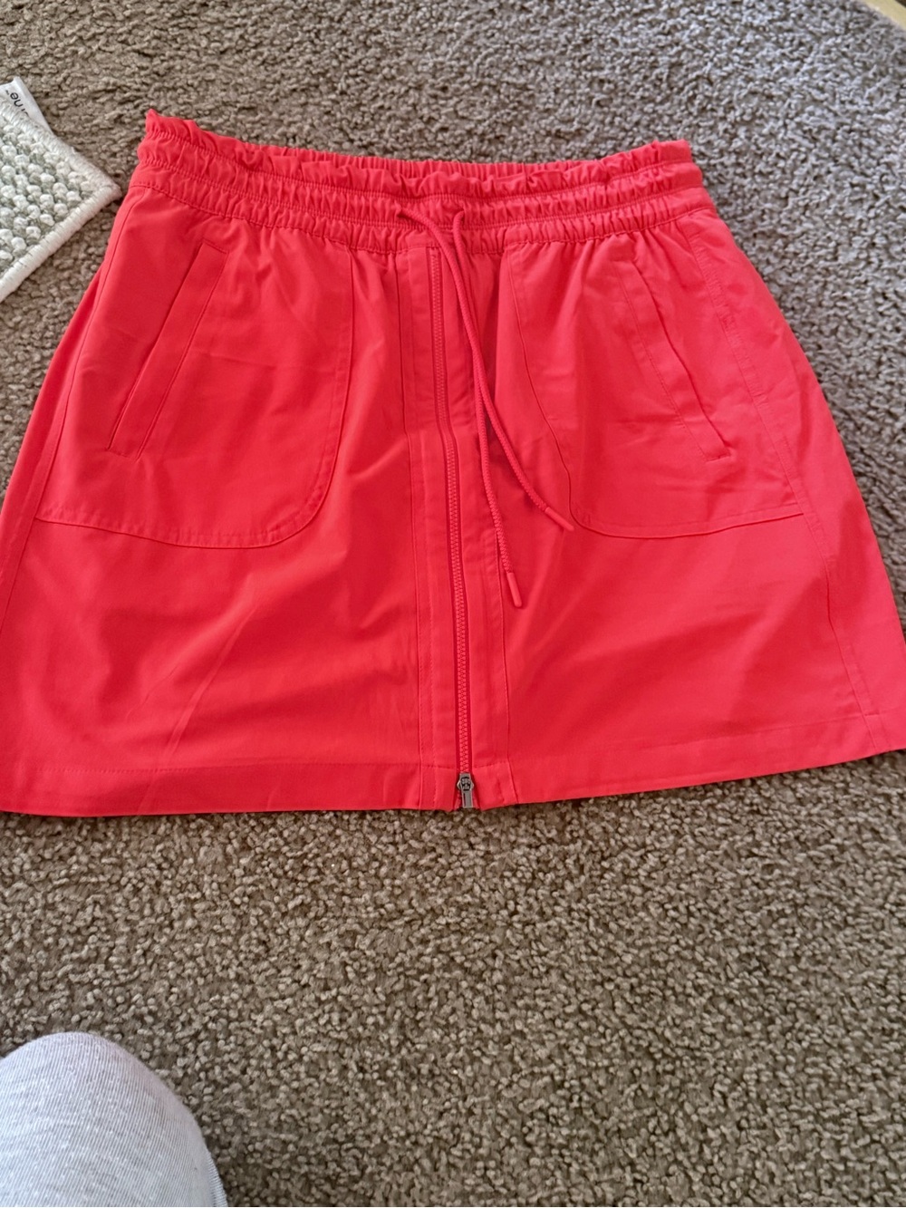 Poppy red color  AthletaZip-Front Mini skort